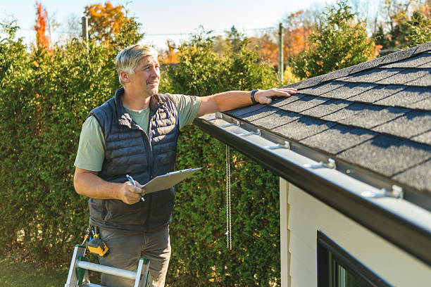 Professional Roofing technician working in Abington, MA